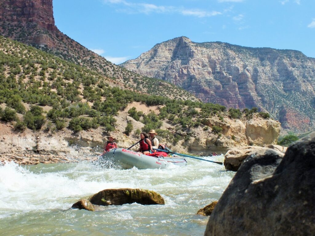 a group of people in a raft